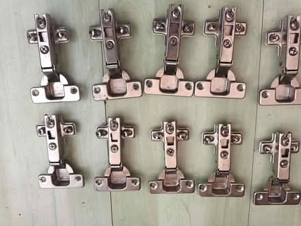 Photo of free Cupboard hinges & handles (Woodley RG5) #1