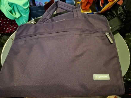 Photo of free Small purple laptop bag never used (SG4) #1