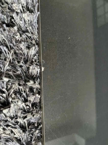 Photo of free 120cm square black tile (2 chips) (TW9) #3