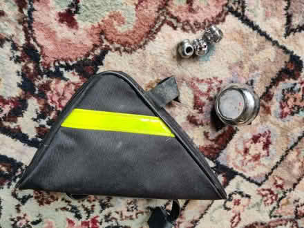 Photo of free Bike bell, valve caps, small zip bag (Greaves LA1) #1