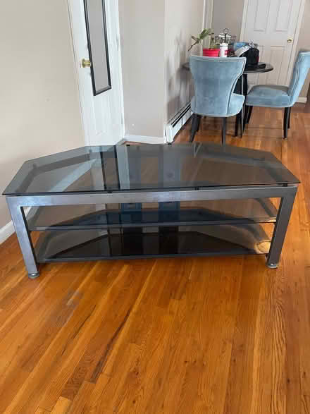 Photo of free Glass TV Stand (Jamaica Queens) #1