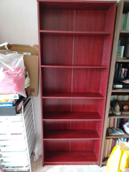 Photo of free Tall solid wooden bookcase (GL51 4UR) #1