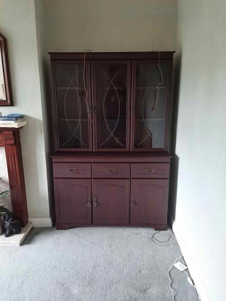 Photo of free Dark wood display/storage cupboard (Streatham SW16) #1