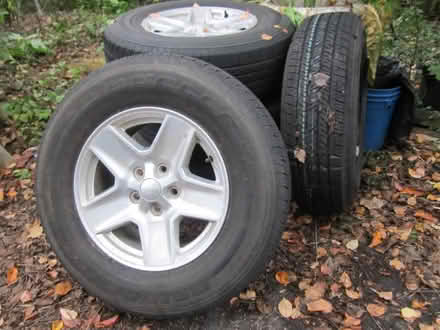 Photo of free Jeep tires and wheels (Bethpage) #1