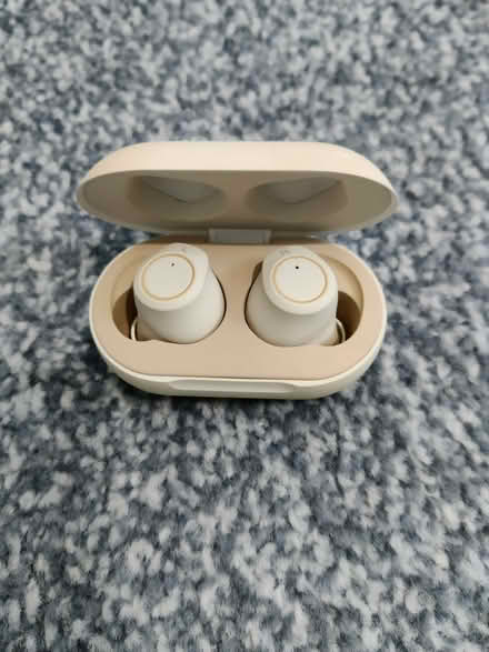 Photo of free Pair of tan coloured wireless ear-buds (with charging case) (Peachcroft OX14) #1