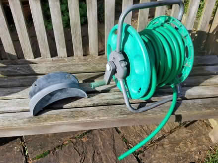 Photo of free Hose on a reel and wall hose hanger (Cherry Orchard) #1