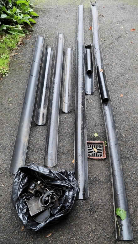Photo of free Quantity of used black plastic guttering (Weybridge KT13) #1
