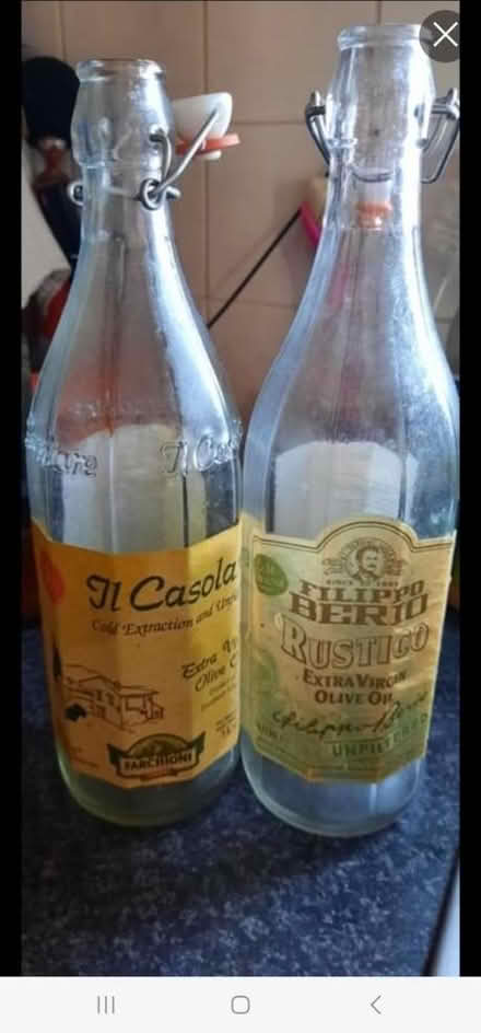 Photo of free 2 clear glass flip lid bottles 1L (Kenton HA3) #1