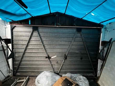 Photo of free Double size garage gate (SM4 lower morden) #1