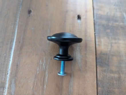 Photo of free 20 x black cupboard knobs with screws (Wandsworth SW18) #1