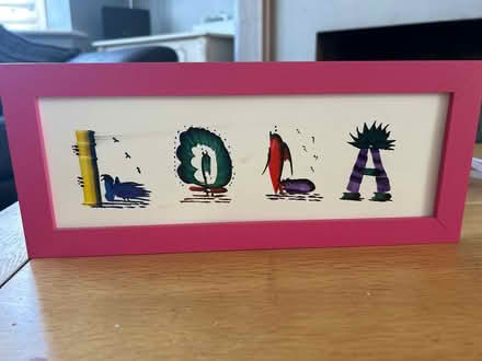 Photo of free Lola sign (IG8 7RB) #1