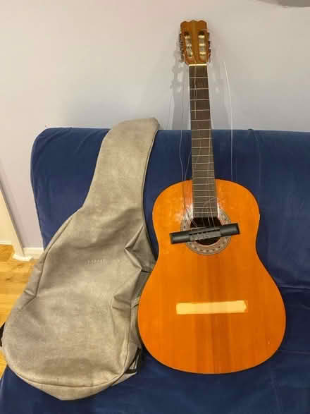 Photo of free Acoustic Guitar (Runcton PO20) #1