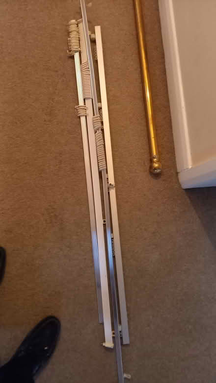 Photo of free Four curtain rails with hooks & brackets (Watton at Stone SG14) #1