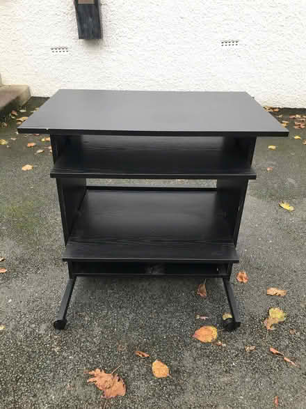 Photo of free Black three shelved computer desk or just a desk on castors (Arnside LA5) #1