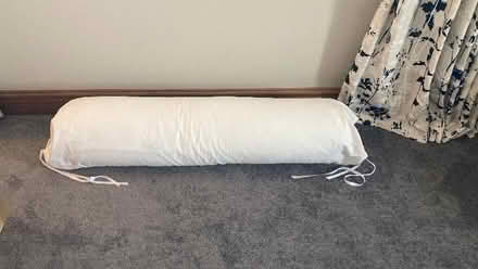 Photo of free Feather bolster cushion with removable cotton cover (Thornton le Moors CH2) #1