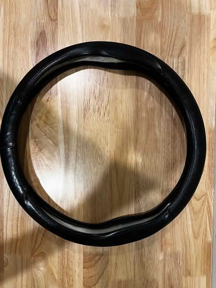 Photo of free 15" Black Steering Wheel Cover (Downtown Dallas) #1