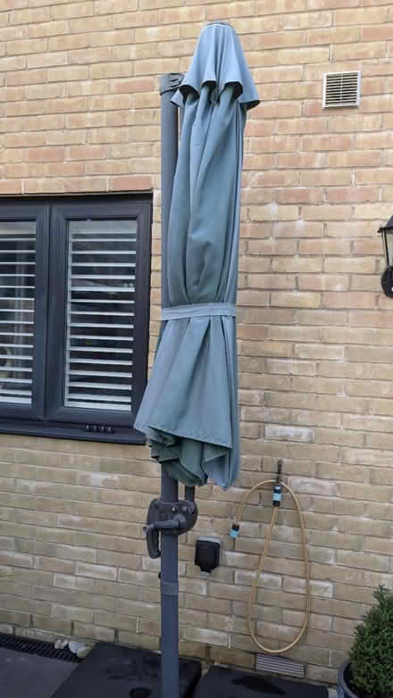 Photo of free Patio Umbrella & base (TN25) #3