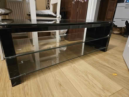 Photo of free Black glass unit-tv stand (Slough, SL2) #1
