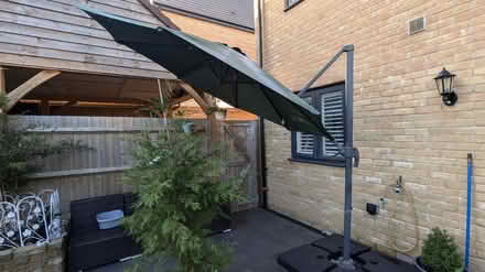 Photo of free Patio Umbrella & base (TN25) #1