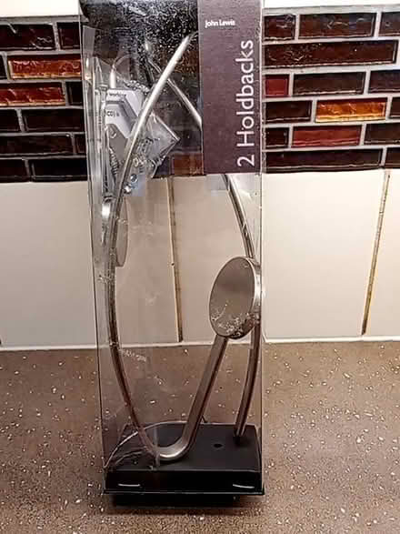 Photo of free Pair of curtain hooks/holebacks (Weston) #1
