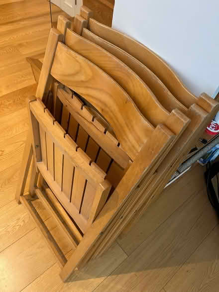 Photo of free Set of four fold up wooden chairs (Kensington W8) #1
