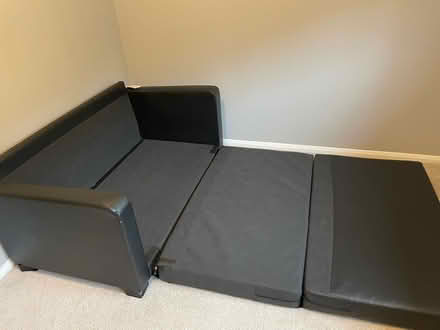 Photo of free Black faux leather sofa bed (Crown Wood RG12) #2