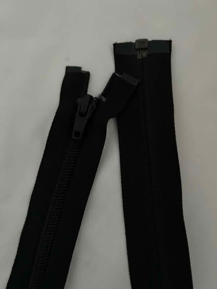 Photo of free Long black zip (new) (Heronsgate end of Chorleywood) #2