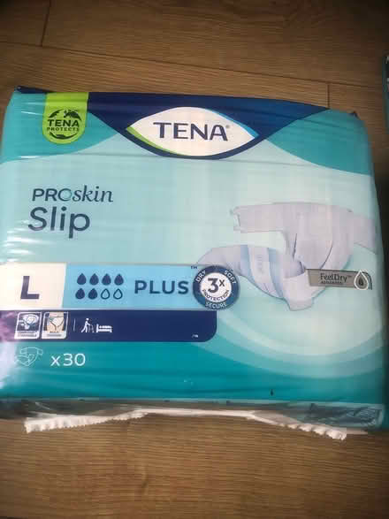 Photo of free 4 unopened packs large Tena slips (West Twerton BA2 1LZ) #1