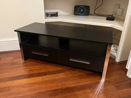 Photo of free Black TV stand (East Hill) #1