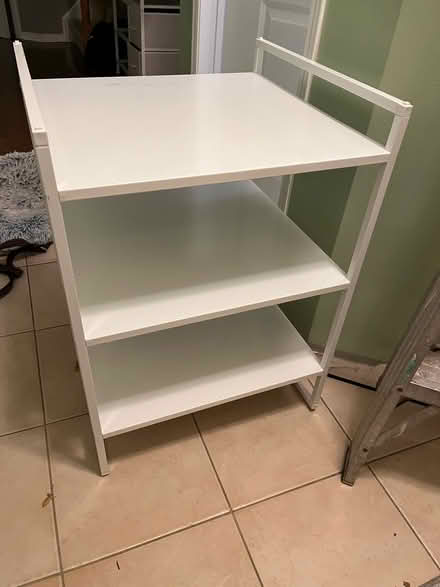 Photo of free White metal shelf (QEW and Third Line) #1