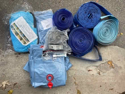 Photo of free Pool backwash hoses and water bags (Ellesmere and Orton Park) #1