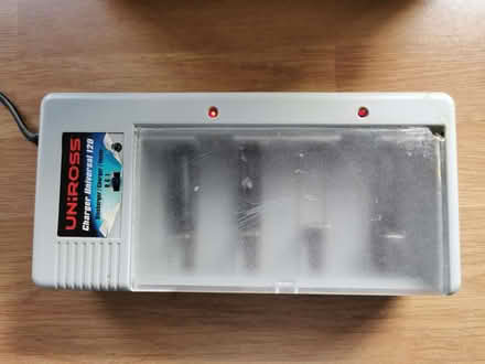 Photo of free Uniross battery charger. (Wood Top) #2