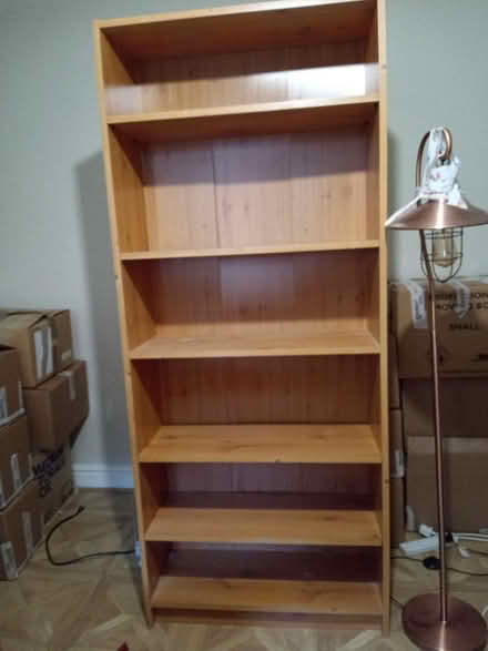 Photo of free Tall pine effect bookcase (Long row Belper) #1