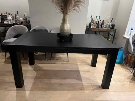 Photo of free Black solid oak dining table (L26) #1