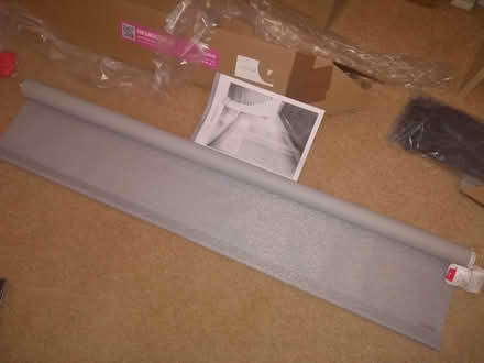 Photo of free New BLACKOUT roller blind in a silver/light grey colour (Knaresborough HG5) #1