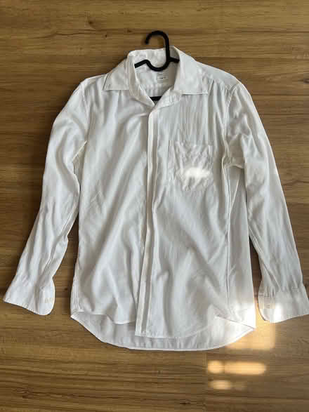 Photo of free Uniqlo work shirt (Serangoon MRT station) #1