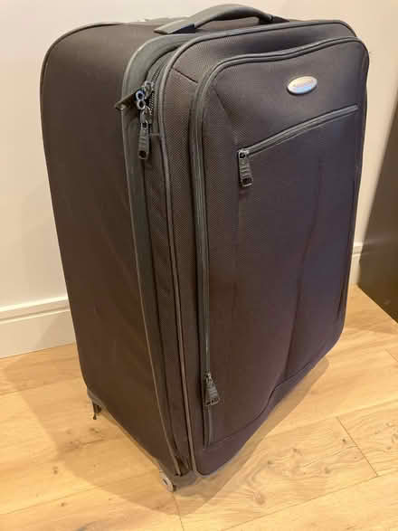 Photo of free Large Suitcase, broken wheels (Epsom) #1