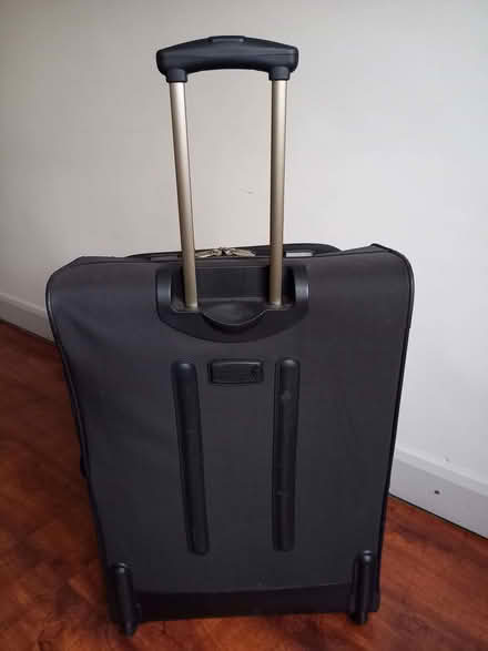 Photo of free Large suitcase (Old Woking GU22) #4