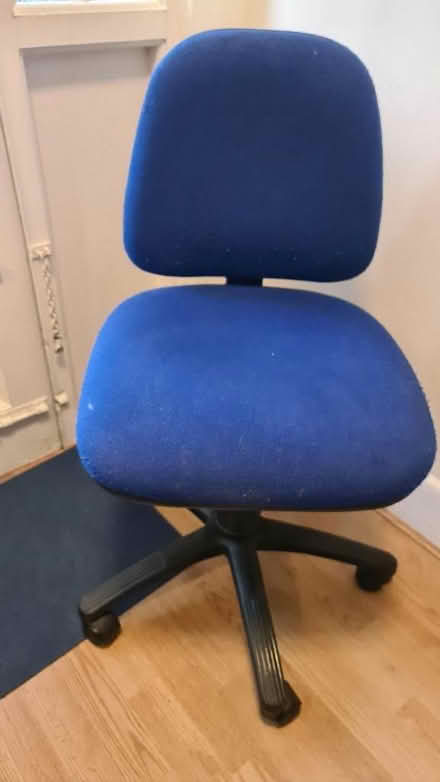 Photo of free Adjustable swivel chair (Knotty Ash L14) #1