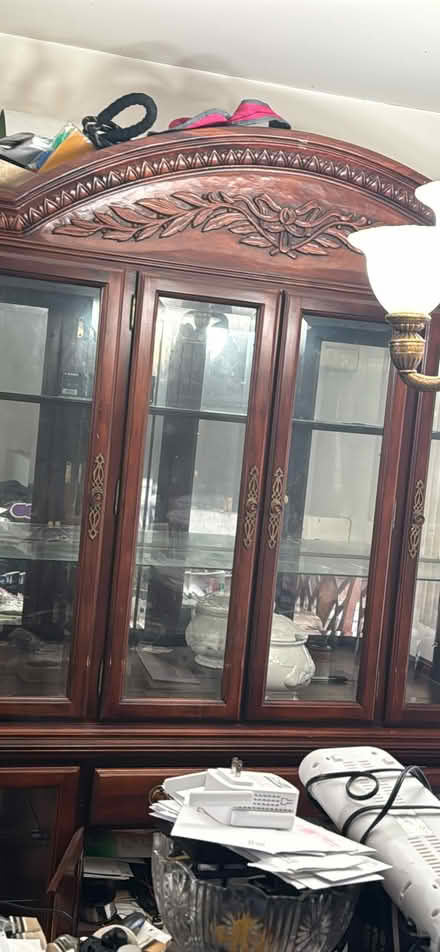 Photo of free China cabinet with 6 chait table (Jamaica Queens) #1