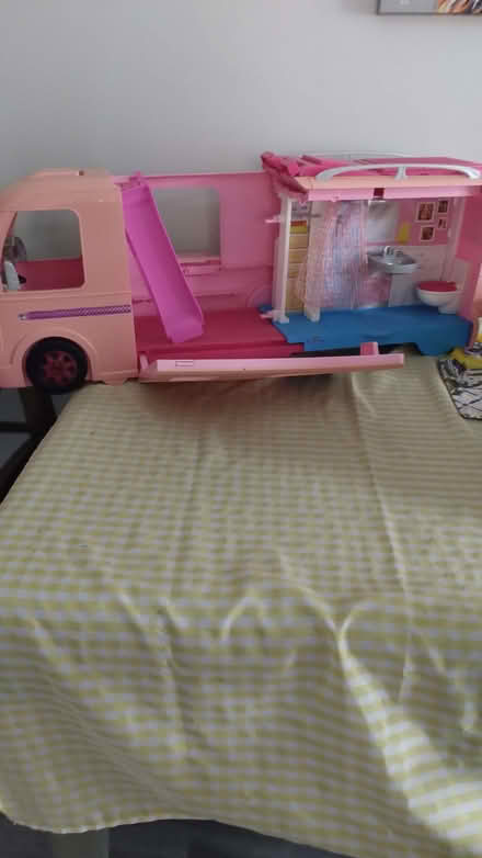 Photo of free Barbie camper van good condition but faded in the sun (Garforth LS25) #1