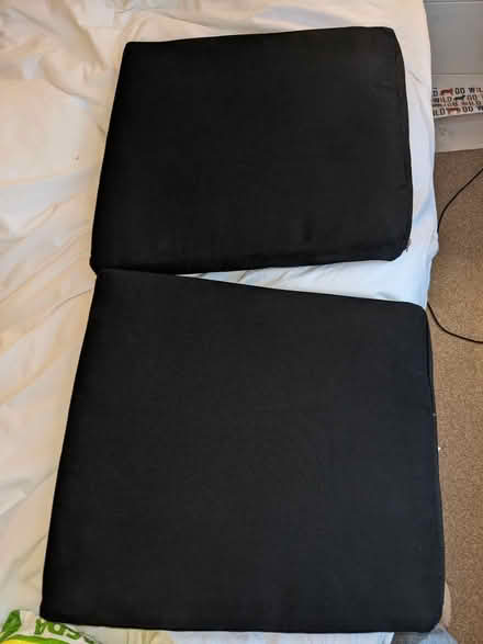 Photo of free 2 black outdoor seats cushions (SW2) #1