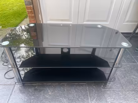 Photo of free Black glass tv stand (PO3 baffins Portsmouth) #1