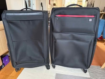 Photo of free 2 large suitcases (SW15 3PF) #1