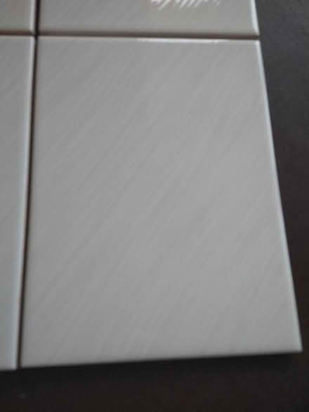 Photo of free 4 cream/grey tiles with fine diagonal stripes. (Garston WD25) #3