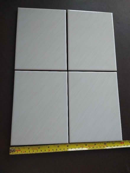 Photo of free 4 cream/grey tiles with fine diagonal stripes. (Garston WD25) #2