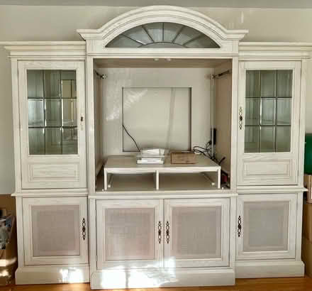 Photo of free Large wood entertainment center (Mansfield Township) #1