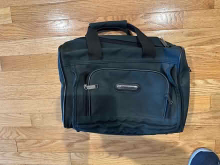Photo of free Small black bag (Hollenbeck and Remington) #2