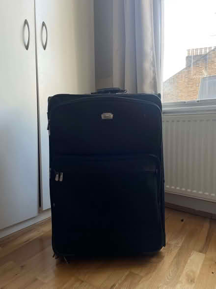 Photo of free Large suitcase with wheels (Newington Green N1) #1
