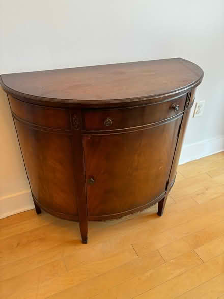Photo of free Rounded mahogany table (Harbor East) #2